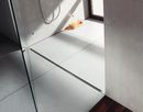 Odwodnienie liniowe do pryszniców z odpływem na poziomie posadzki w łazienkach remontowanych