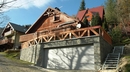 Dom w Szczyrku z gabionami i lokalnym piaskowcem