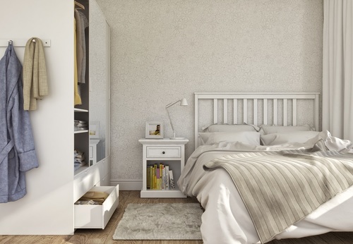 Jak zaaranżować ścianę w sypialni, aby współgrała z wyglądem łóżka?